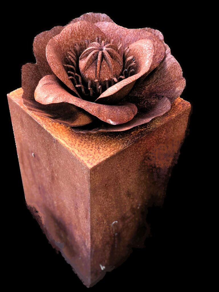 A cor-ten steel sculptural urn depicting a poppy.